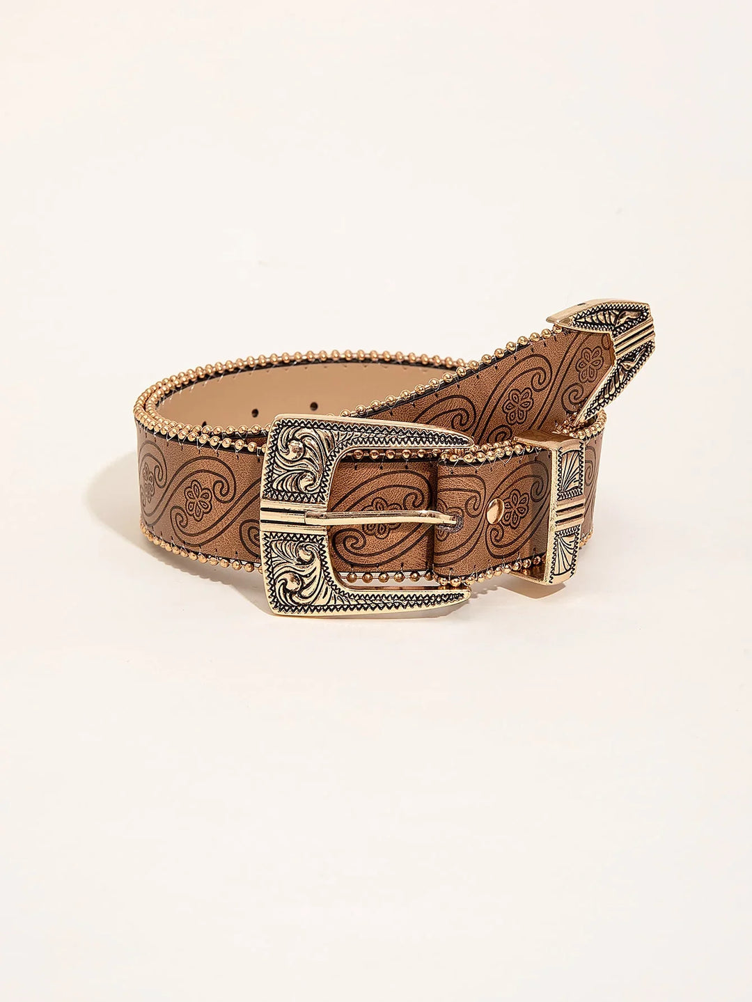 Brown leather belt with floral patterns and decorative gold buckle against a white background