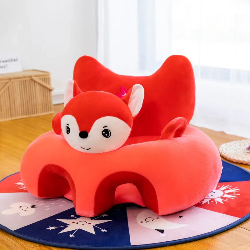 Red plush children's chair with fox face design on colorful star and moon patterned rug