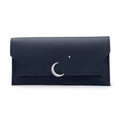 Black leather wallet with silver crescent moon and star embellishments on front flap