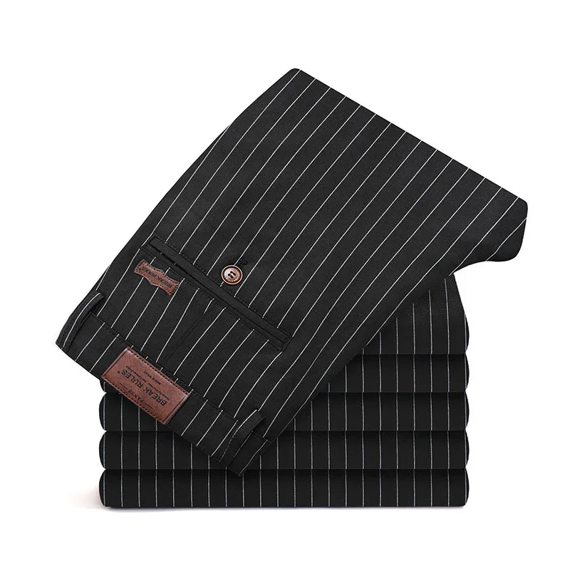 Stack of black pinstripe formal dress pants with buttoned back pocket and branded leather patch