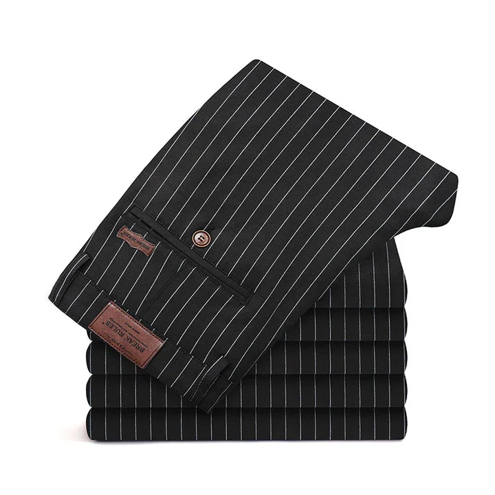 Stack of black pinstripe formal dress pants with buttoned back pocket and branded leather patch