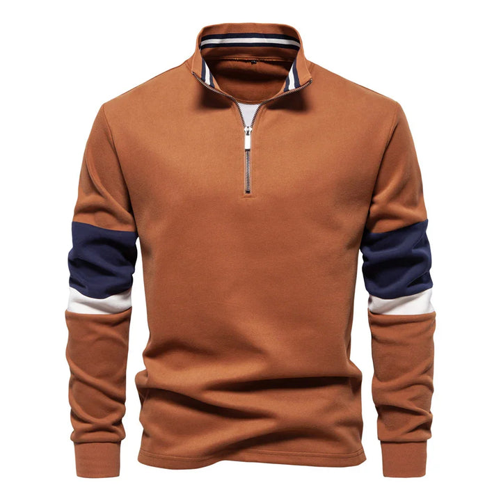 Men's brown quarter-zip sweatshirt with navy and white color-block sleeve accents