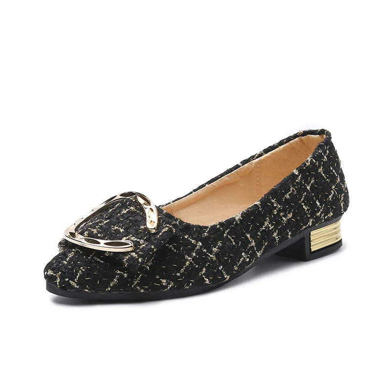 Black tweed flat shoe with gold buckle detail and low gold-accented heel