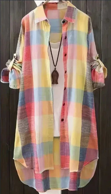 Long multicolor pastel plaid shirt with rolled-up sleeves over white tank top, wooden pendant necklace