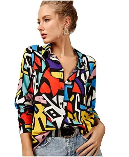 Woman wearing a colorful geometric print button-up shirt with black belt and blue jeans