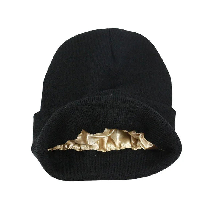 black knit beanie hat with shiny beige satin lining inside