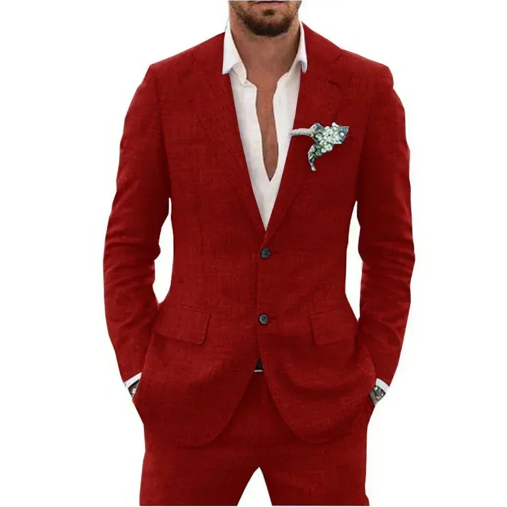 Man wearing a red suit with a white shirt and floral pocket square