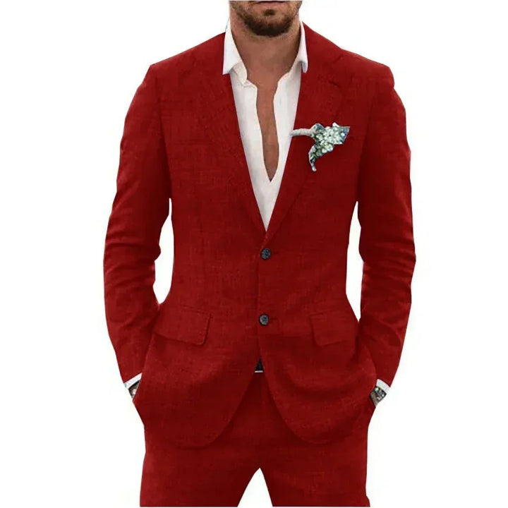 Man wearing a red suit with a white shirt and floral pocket square