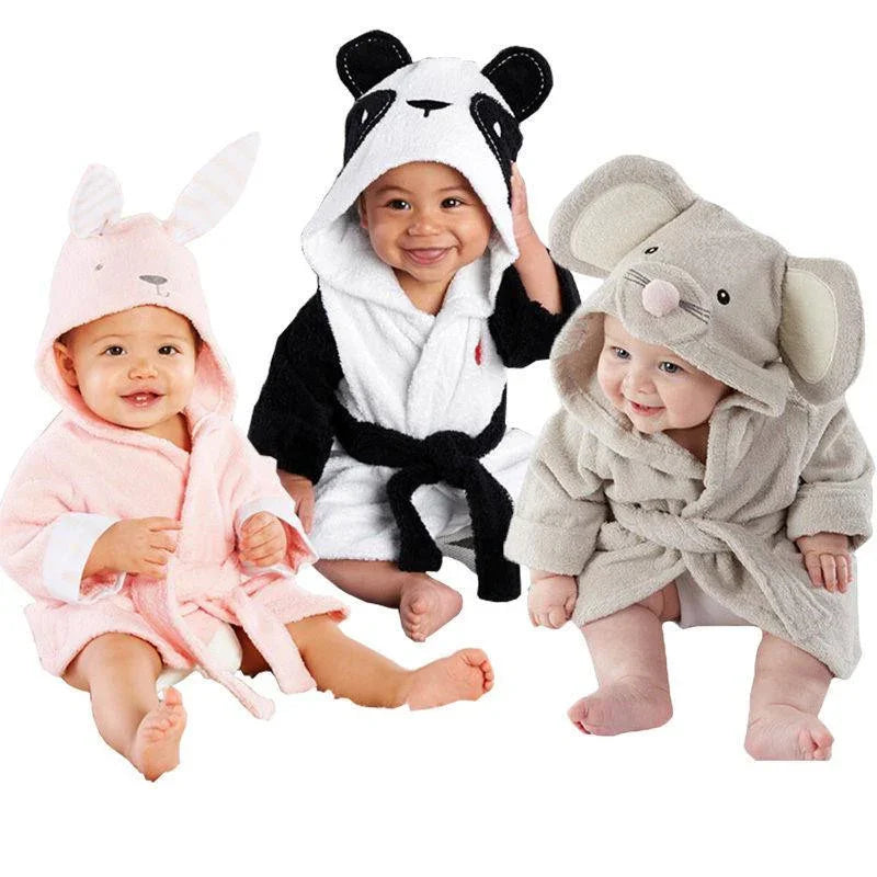 Three babies wearing soft animal hooded bathrobes: pink bunny, black and white panda, gray elephant.