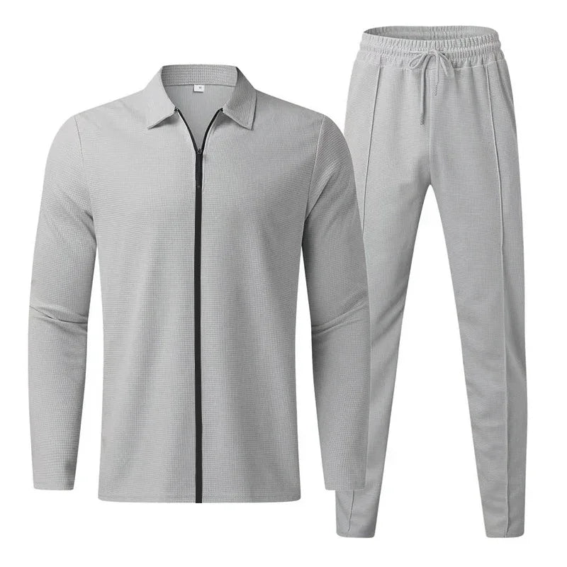 Light gray men's casual tracksuit with zip-up jacket and drawstring jogger pants