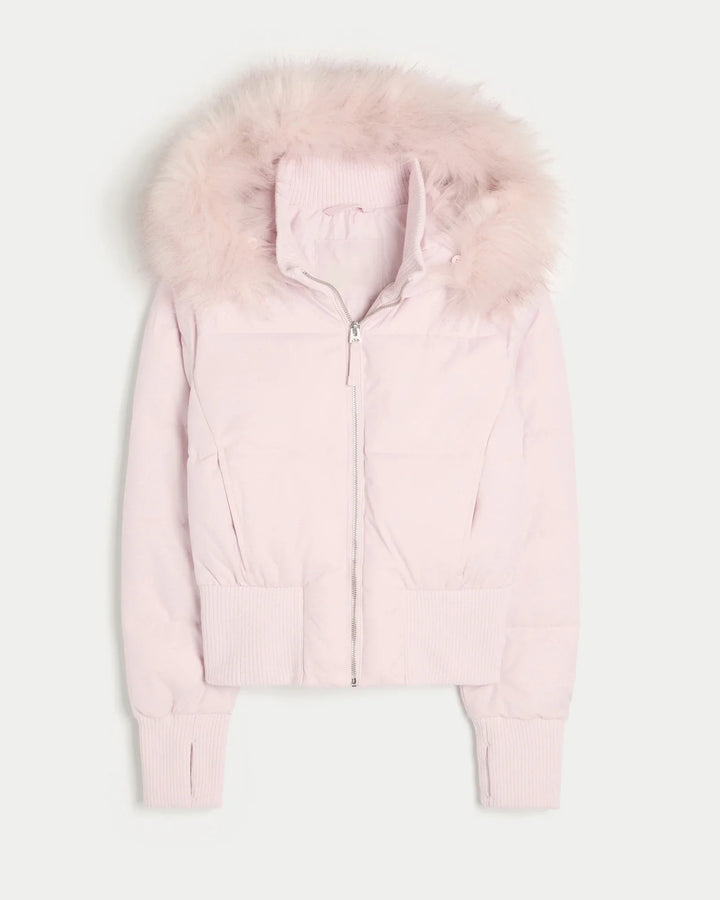 Light pink padded winter jacket with fluffy fur hood and ribbed cuffs and hem