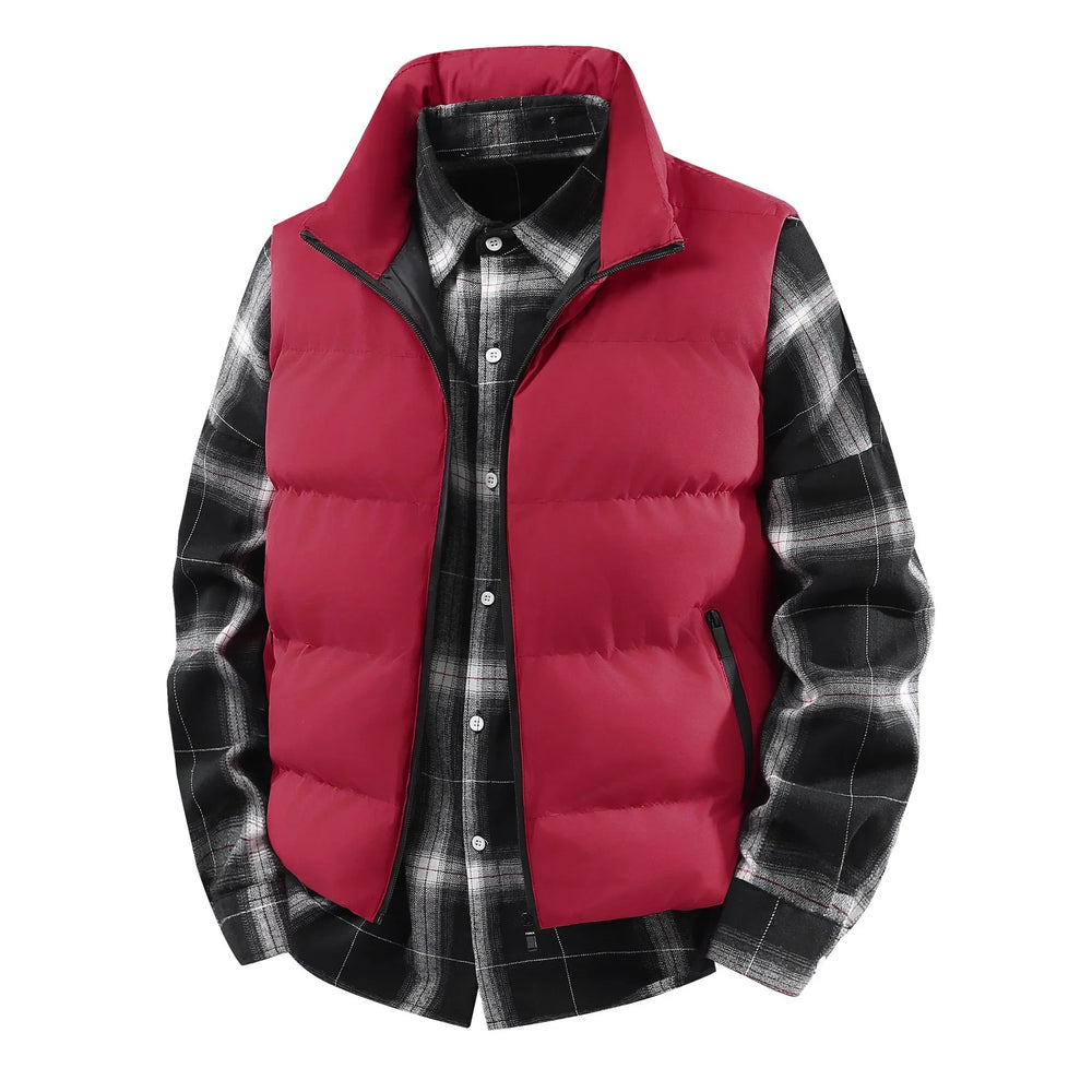 Men's red puffer vest layered over black and white plaid flannel shirt with button-up front