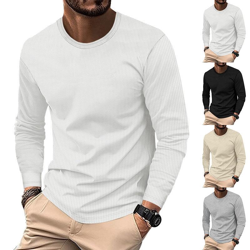 Man wearing a white long sleeve casual t-shirt with beige pants and wrist accessories, showing four color options