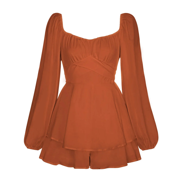 Rust orange women's long sleeve romper with square neckline and layered skirt detail