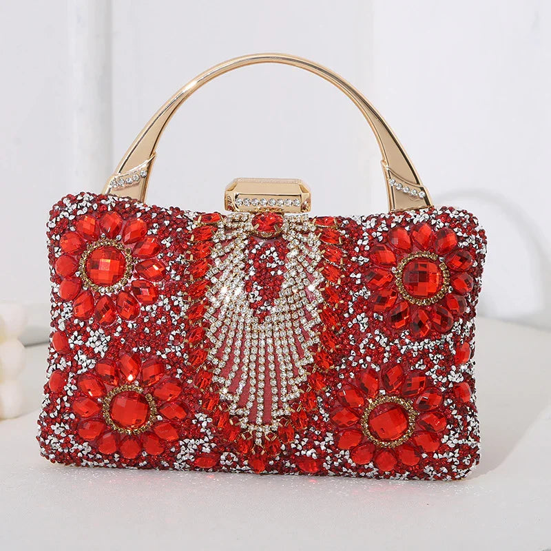 Elegant red crystal evening clutch bag with gold handle and floral gemstone embellishments