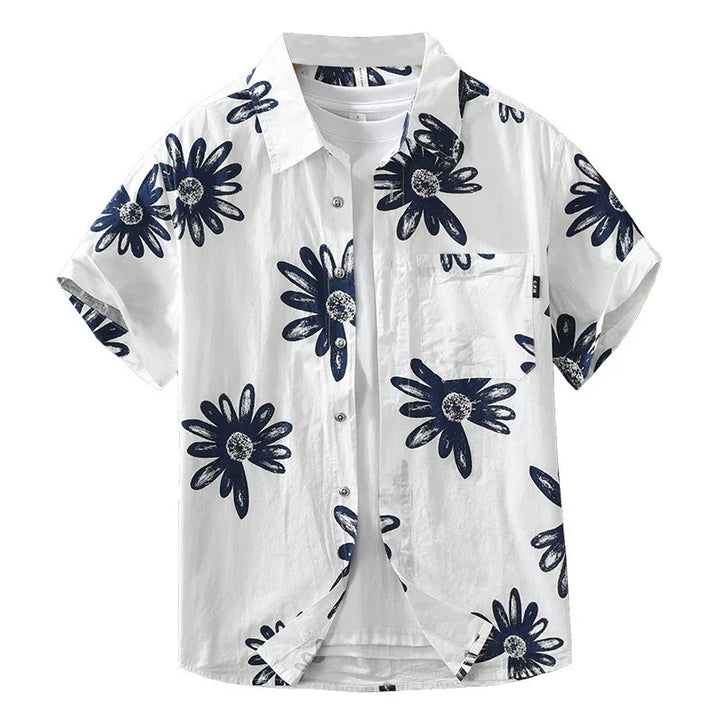 White short-sleeve button-up shirt with navy blue floral print and chest pocket