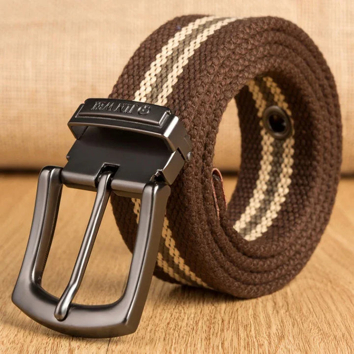 Close-up of a brown woven fabric belt with beige stripes and a black metal buckle on wooden surface