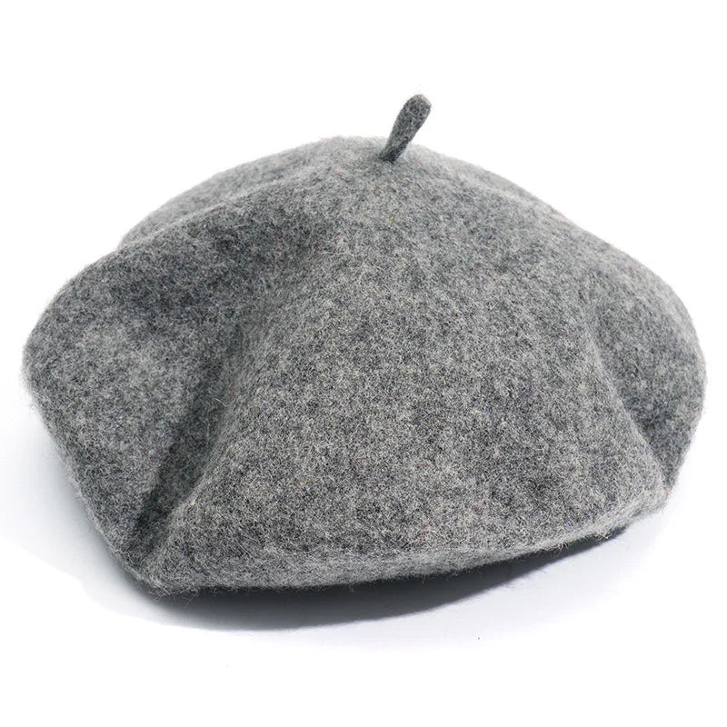 Gray wool felt beret hat with top stem on white background