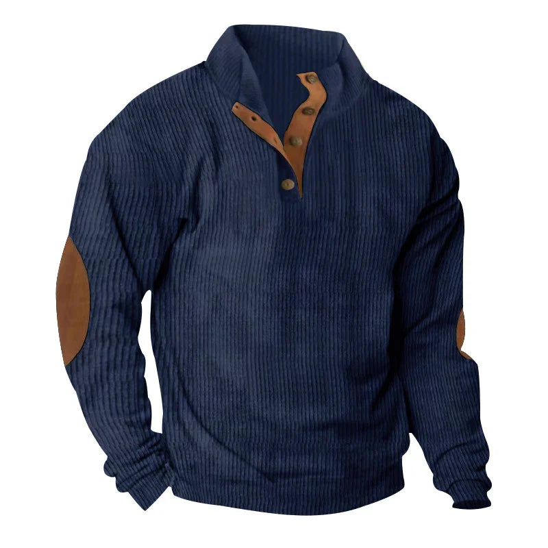 Navy blue corduroy pullover sweater with brown button placket and elbow patches