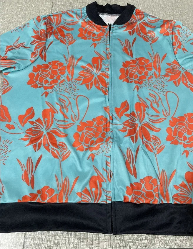 Blue jacket with orange floral print, black collar and hem, front zipper closure