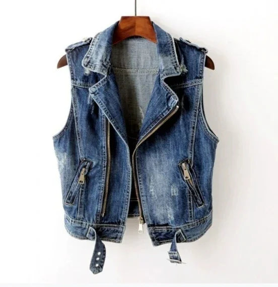 blue denim sleeveless vest with zipper and belt details on wooden hanger