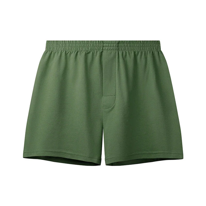 Plain green men's cotton boxer shorts with elastic waistband and fly front