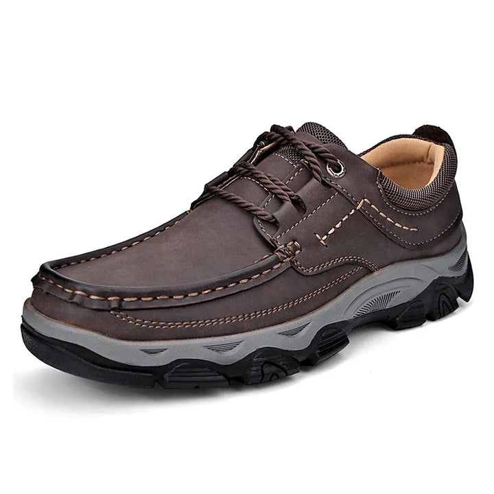 Dark brown leather casual men's shoe with thick gray and black sole and rope-style laces