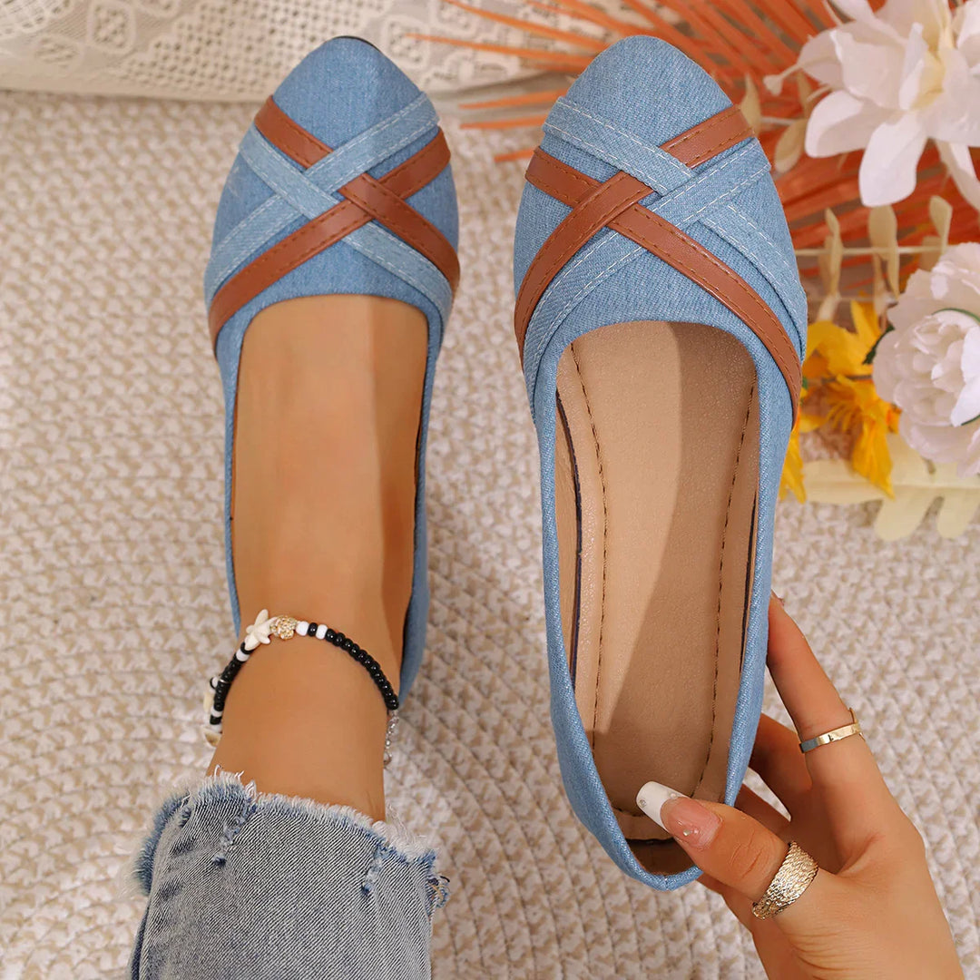 Blue denim flats with brown cross straps worn with frayed jeans and beaded ankle bracelet