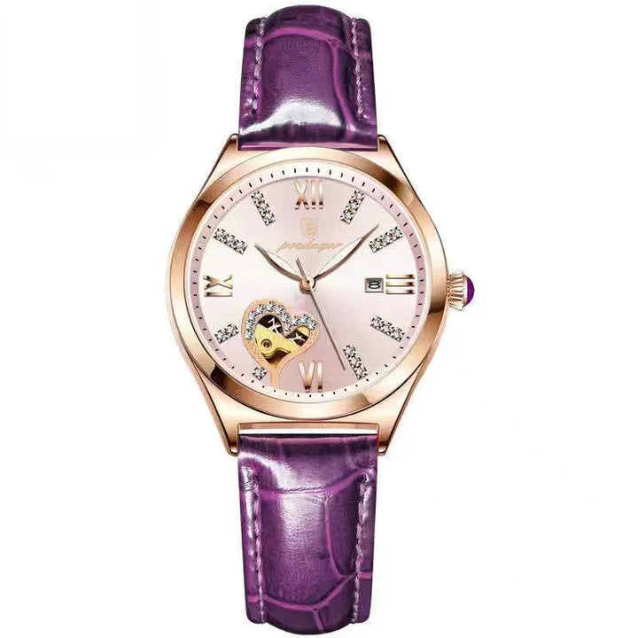 Elegant rose gold wristwatch with purple leather strap, diamond markers, heart-shaped detail, and date display