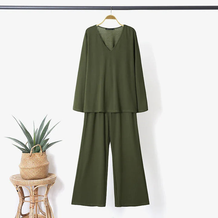 olive green long sleeve V-neck top and wide leg pants set hanging on wooden hanger