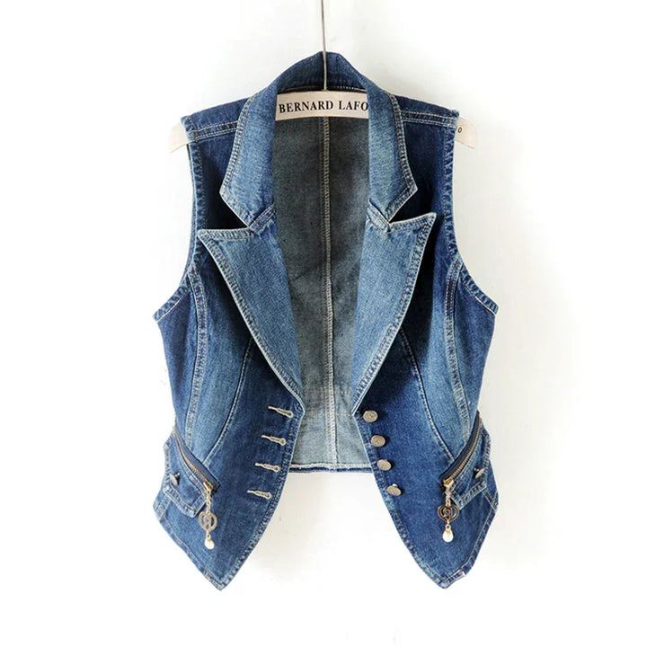 Blue denim sleeveless vest with lapel collar, zipper pockets, and metal buttons on hanger