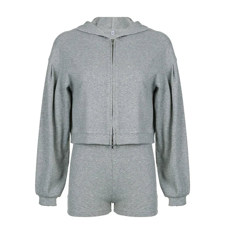 Gray ribbed knit two-piece lounge set with zip-up hoodie and high-waisted shorts
