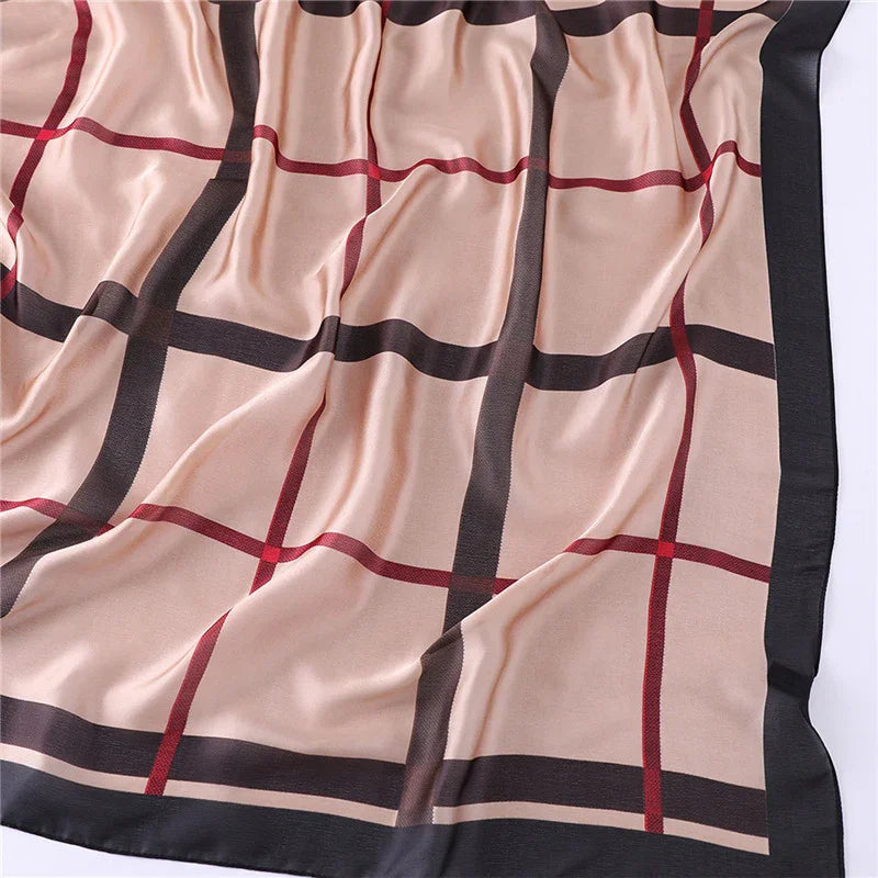 Beige silk scarf with black and red plaid pattern and black border