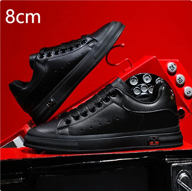 Black leather sneakers displayed with red vintage rotary phone backdrop on vivid red and black surface