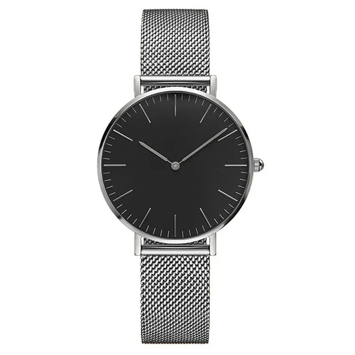 Minimalist wristwatch with black dial and silver mesh stainless steel band