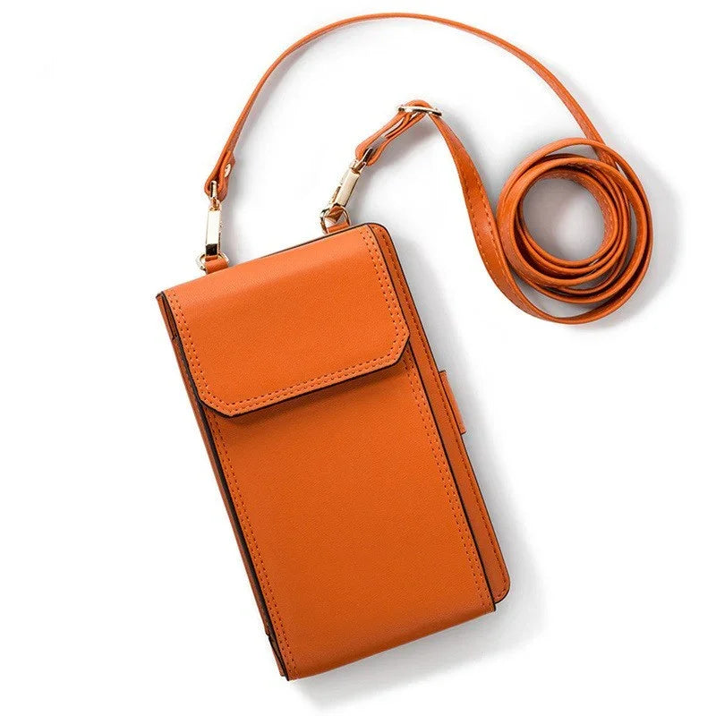 Compact orange leather crossbody wallet with adjustable strap on white background