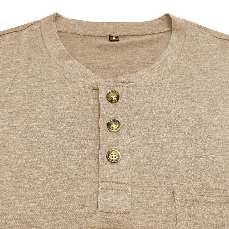 Close-up of beige Henley shirt with three brown buttons and round neckline