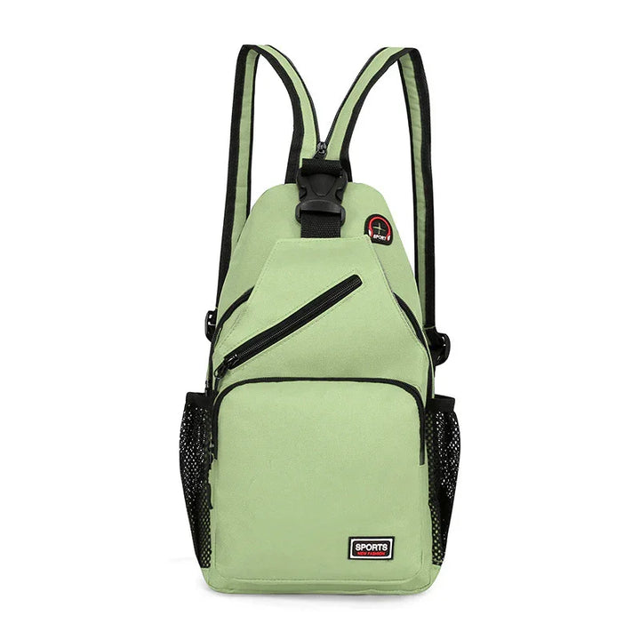 Light green sports backpack with black zippers, mesh side pockets, and adjustable straps