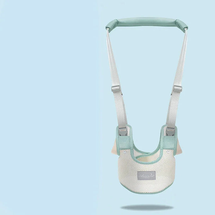 Light blue and white baby walking harness with adjustable straps on a blue background