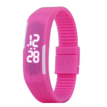 Pink digital sports watch with LED time display and adjustable silicone strap