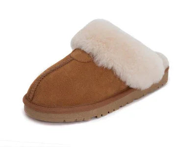 brown suede slipper with thick cream-colored fur lining and rubber sole