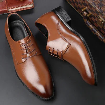 brown leather men's dress shoes with laces on black surface beside wallets
