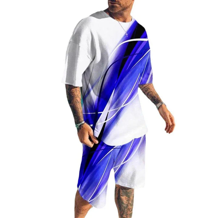 Man wearing white and blue abstract patterned short sleeve shirt and matching shorts set