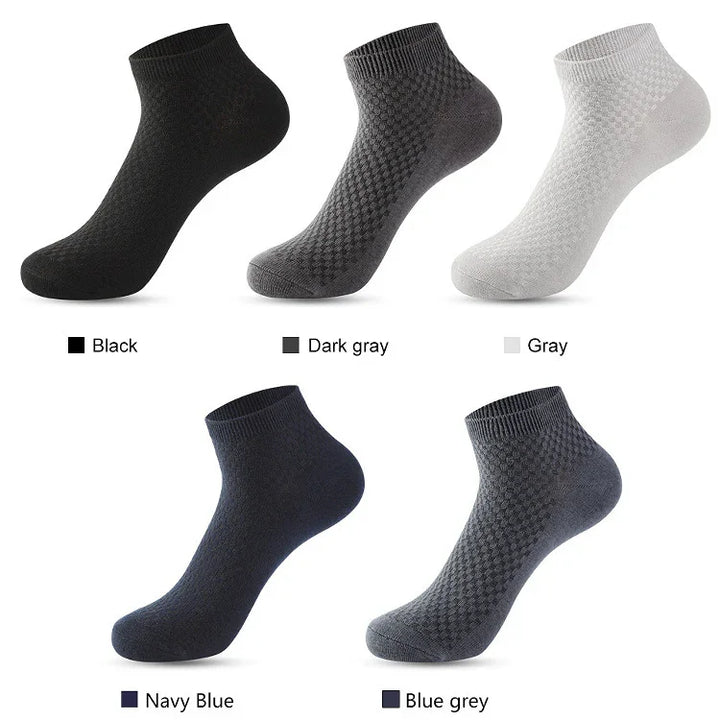 Set of five ankle socks in black, dark gray, gray, navy blue, and blue gray with textured patterns