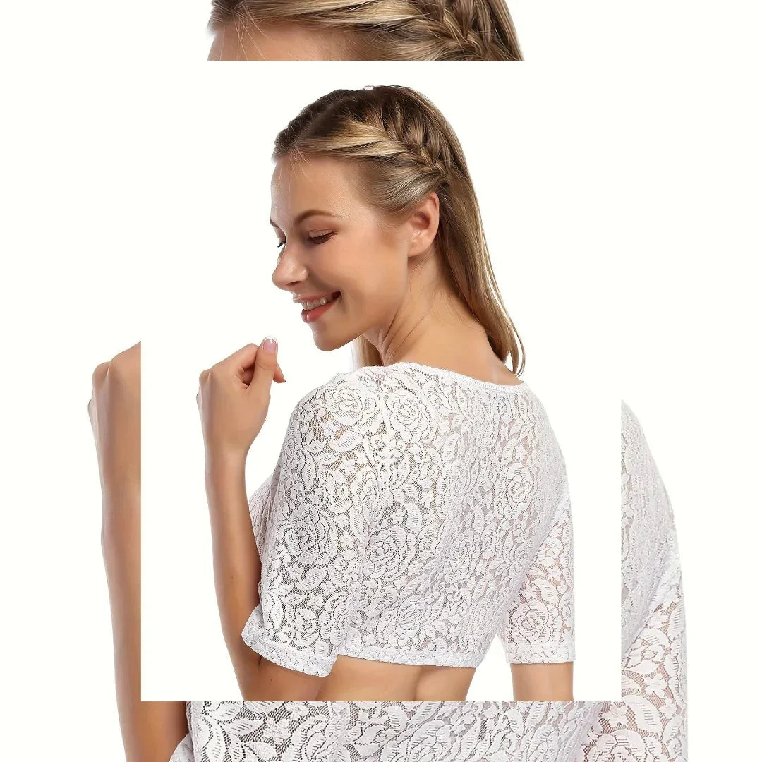 Smiling woman with braided hair wearing a white floral lace cropped top against white background
