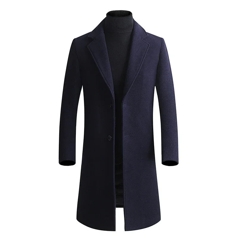 Men's navy blue wool overcoat with notch lapels and two-button closure over black turtleneck sweater