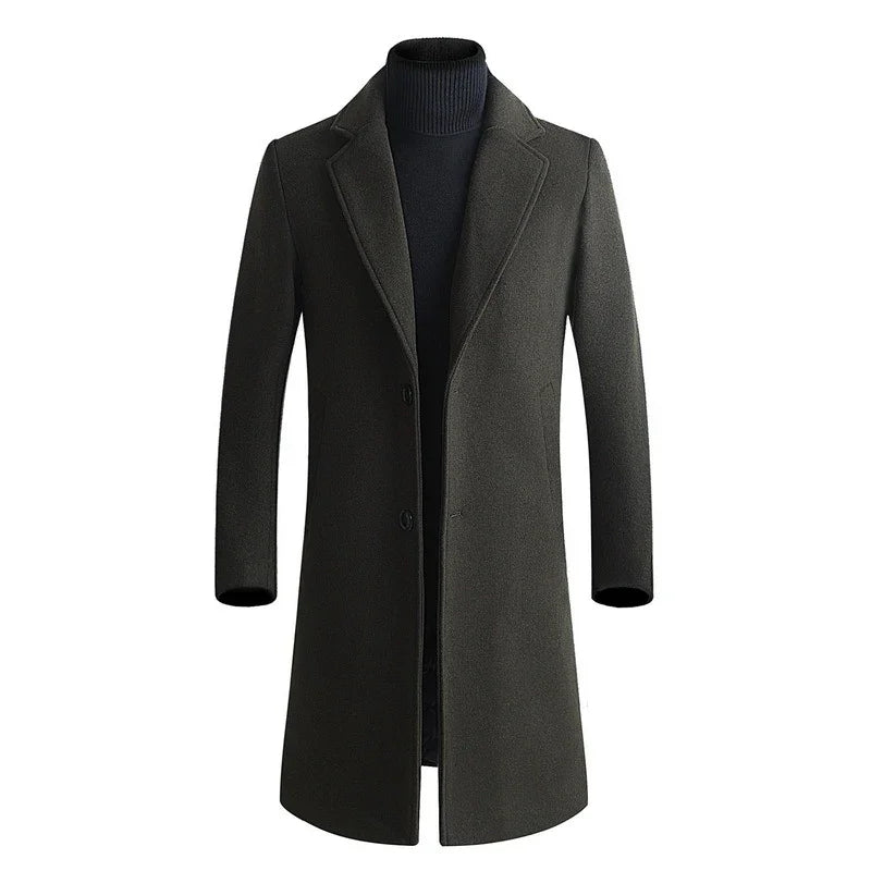 Men's dark gray wool blend long overcoat with notch lapel and two-button closure over black turtleneck