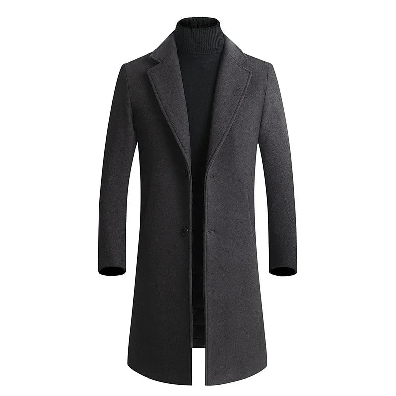 Men's dark gray wool blend long coat with lapel collar over black turtleneck sweater