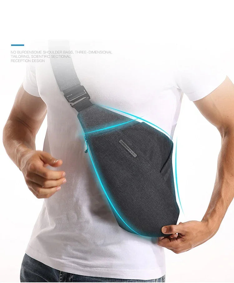 Man wearing a black crossbody sling bag with ergonomic three-dimensional tailoring over white t-shirt