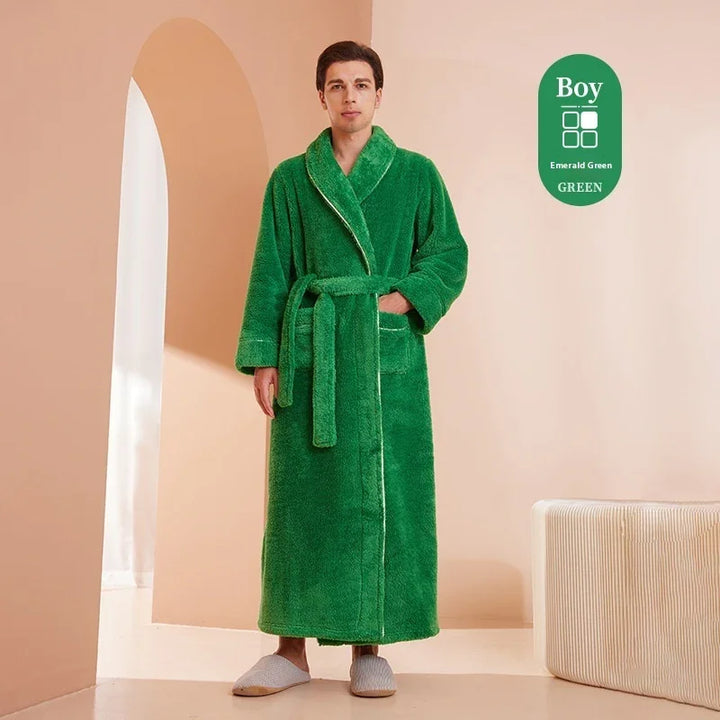 Man wearing emerald green plush bathrobe with belt and pockets in minimal beige room